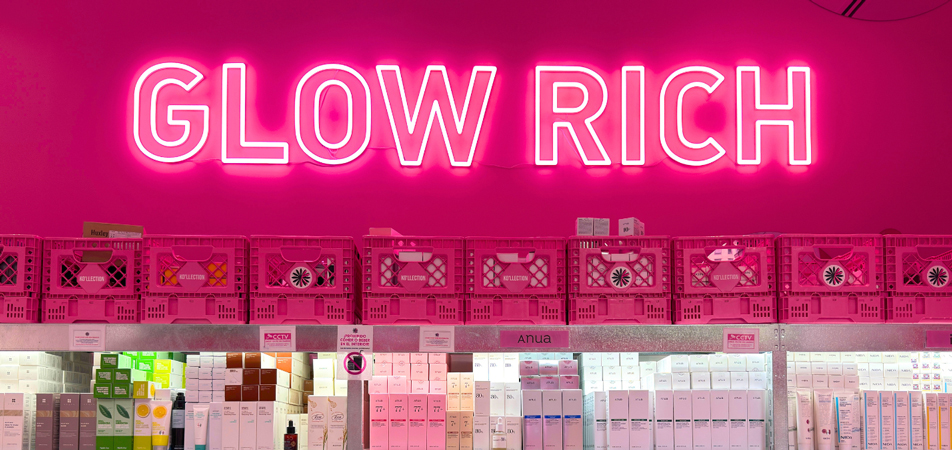 Ko'llection store interior showing pink shelves with K-beauty products
